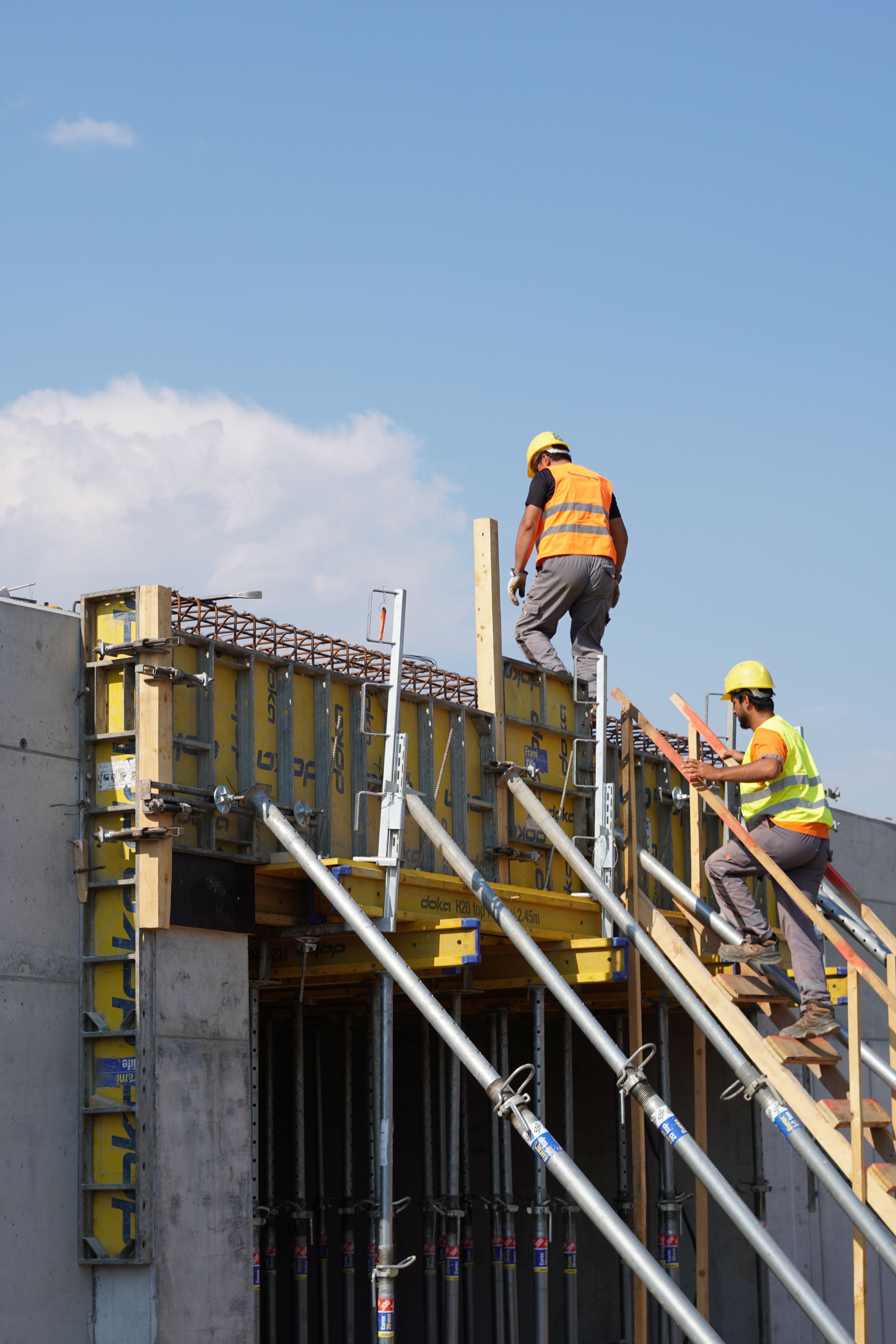 Engineering team working on industrial construction plans