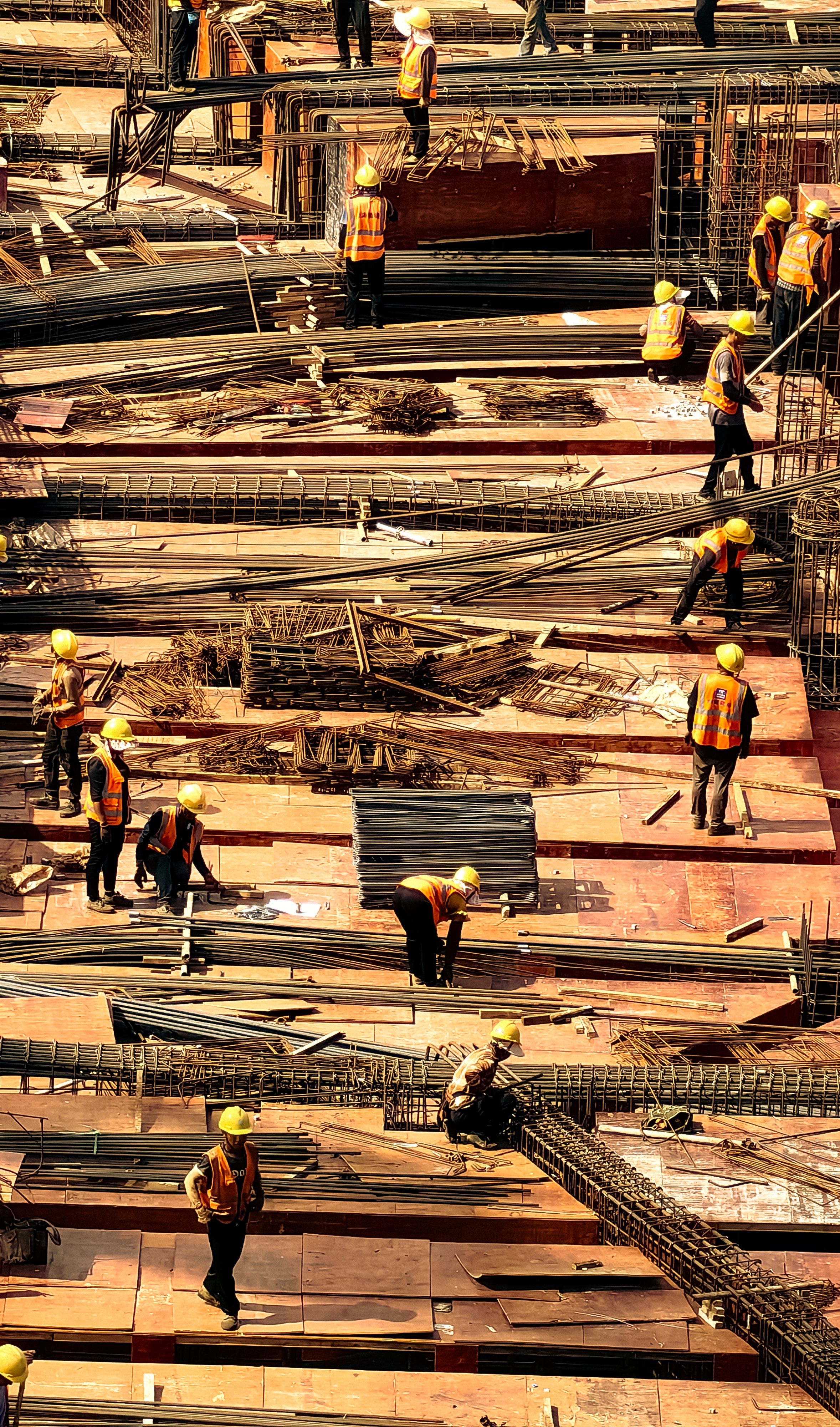 Construction workers using fall protection at height
