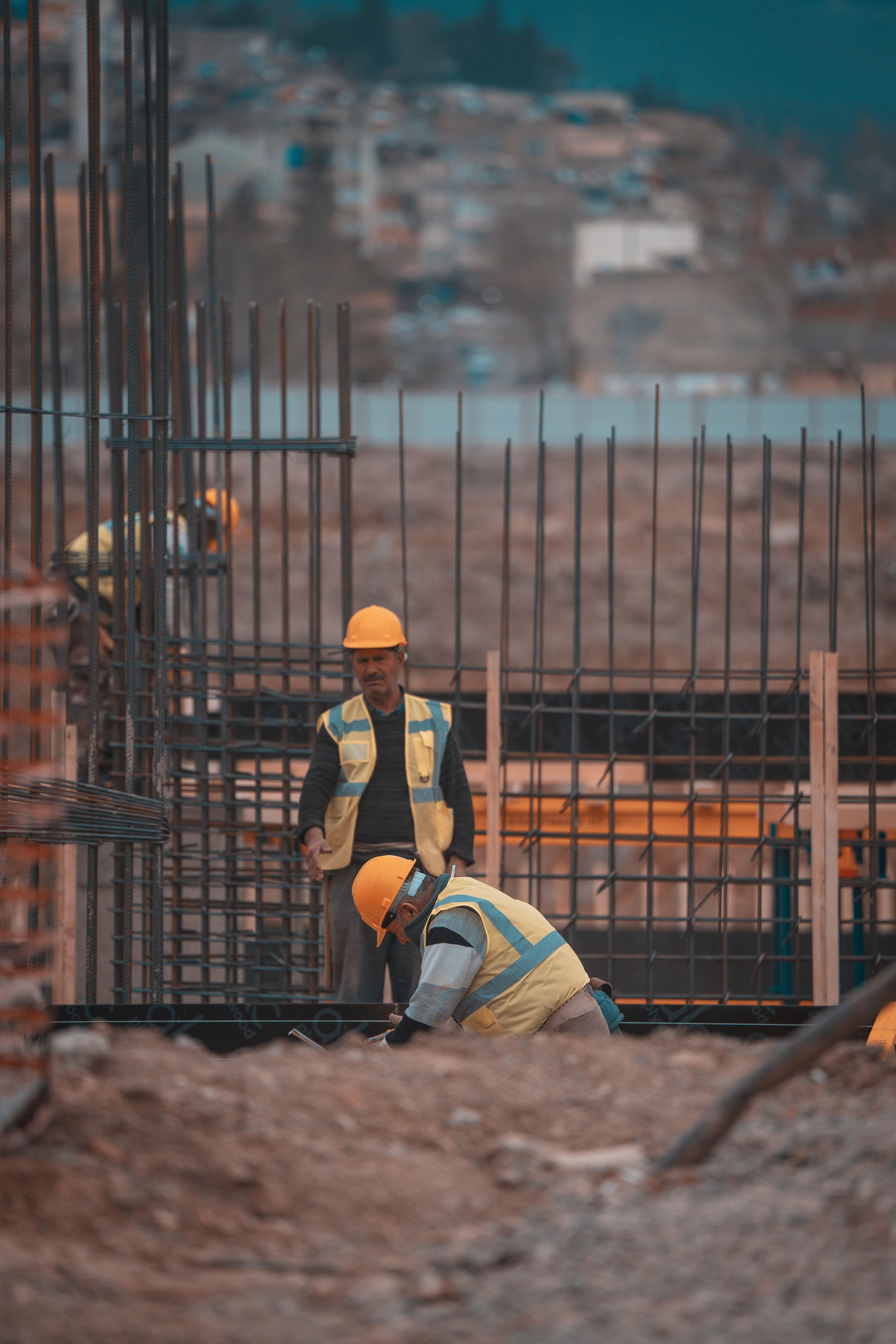 Safety supervisor monitoring construction work